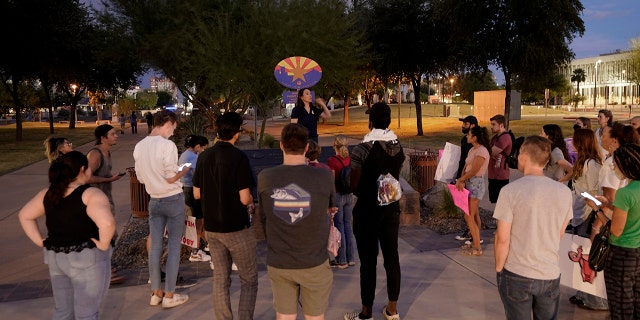 Protesters gather outside the Capitol to voice their dissent with an abortion ruling, Friday, Sept. 23, 2022, in Phoenix. 