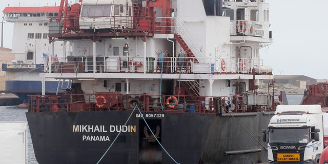 The Russian ship Mikhail Dudin docks at the port of Dunkirk, northern France, Tuesday, Sept. 13, 2022. While Europe is cracking down on Russia's oil and gas, it's continuing to import and export nuclear fuel from and to the country, as the sector is not under sanctions prompted by the war in Ukraine.