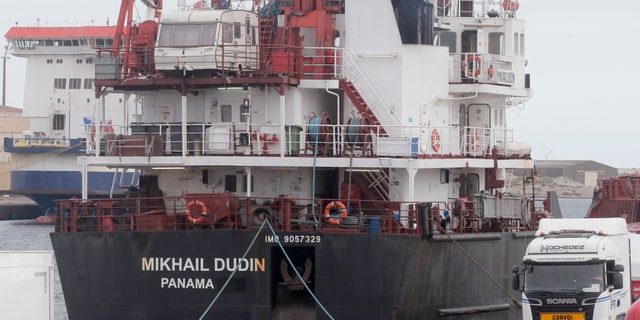 The Russian ship Mikhail Dudin docks at the port of Dunkirk, northern France, Tuesday, Sept. 13, 2022. While Europe is cracking down on Russia's oil and gas, it's continuing to import and export nuclear fuel from and to the country, as the sector is not under sanctions prompted by the war in Ukraine.