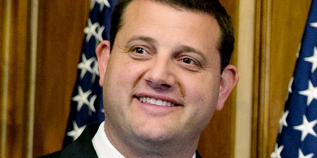 Rep. David Valadao, R-Calif., poses during a ceremonial re-enactment of his swearing-in ceremony in the Rayburn Room on Capitol Hill on Jan. 6, 2015.