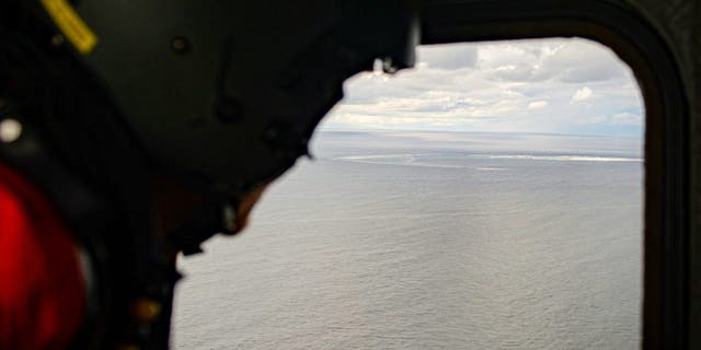 In this photo provided by the Armed Forces of Denmark, the crew in a helicopter of the Armed Forces monitors the gas leak, in the Baltic Sea, Thursday, Sept. 29, 2022.