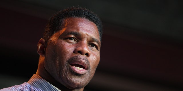 Herschel Walker, GOP candidate for the US Senate for Georgia, speaks at a primary watch party on May 23, 2022, at the Foundry restaurant in Athens, Ga.