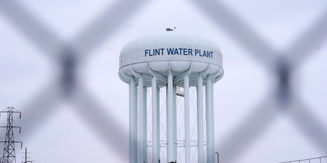 The Flint water plant tower is seen on Jan. 6, 2022, in Flint, Mich.