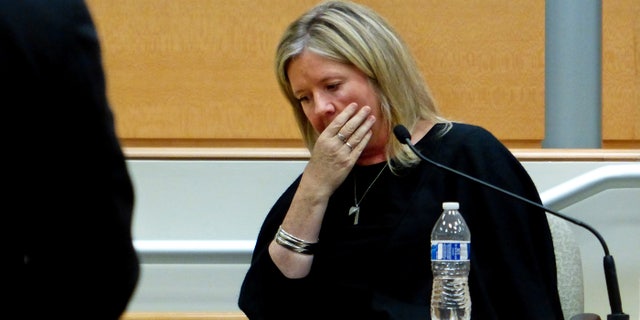 Jacqueline Barden pauses as she testifies during the Alex Jones Sandy Hook defamation damages trial at Connecticut Superior Court in Waterbury, Conn., on Oct. 4, 2022.