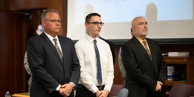 Paul Bellar, middle, appears before Jackson County Circuit Court Judge Thomas Wilson on Wednesday, Oct. 5, 2022 for trial in Jackson, Mich. 