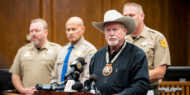 Merced County Sheriff Vern Warnke, foreground, speaks at a news conference about the kidnapping of 8-month-old Aroohi Dheri, her mother Jasleen Kaur, her father Jasdeep Singh, and her uncle Amandeep Singh, in Merced, Calif., on Wednesday, Oct. 5, 2022.