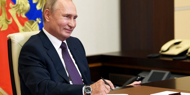 FILE - Russian President Vladimir Putin at the Novo-Ogaryovo residence outside Moscow, Russia, Thursday, Aug. 20, 2020.