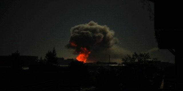 Smoke rises after big explosions in Kharkiv, Ukraine, early Saturday, Oct. 8, 2022.