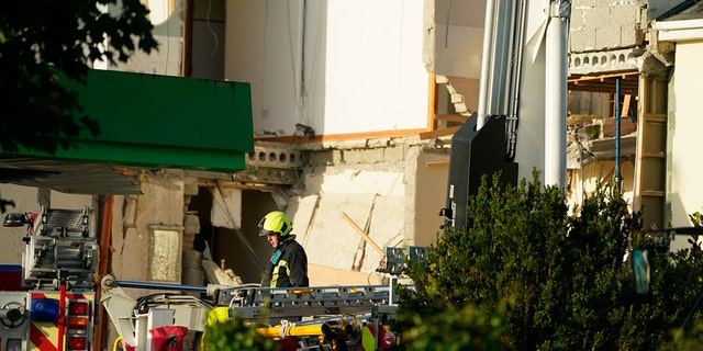 Emergency services work at the scene of an explosion at Applegreen service station in the village of Creeslough in Co Donegal, Ireland, Saturday, Oct. 8, 2022. 