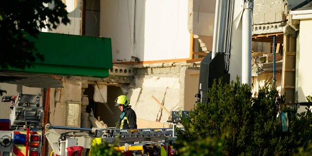 Emergency services work at the scene of an explosion at Applegreen service station in the village of Creeslough in Co Donegal, Ireland, Saturday, Oct. 8, 2022.