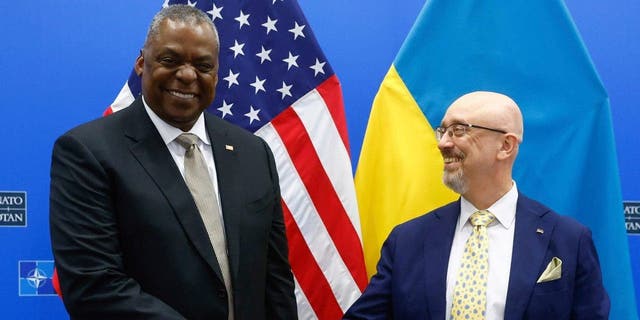 US Secretary of Defense Lloyd J. Austin III, right, shakes hands with Ukrainian Defense Minister Oleksii Reznikov during a bilateral meeting ahead of a NATO Council defense ministers meeting at Alliance Headquarters in Brussels, Wednesday 12 October 2022. 