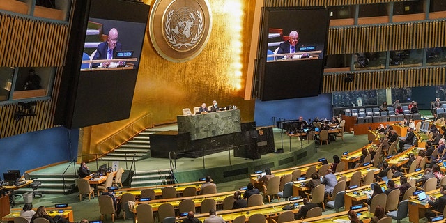 Live video monitors show United Nations Ambassador from Russia, Vasily Nebenzya, addressing the U.N. General Assembly before a vote on a resolution condemning Russia's illegal referendum in Ukraine, Wednesday Oct. 12, 2022 at U.N. headquarters. 