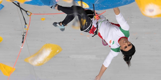 Iranian athlete Elnaz Rekabi competes during the women's Boulder Lead final during the IFSC Climbing Asian Championships, in Seoul, Sunday, Oct. 16, 2022.