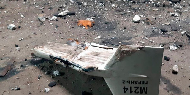 This undated photograph released by the Ukrainian military's Strategic Communications Directorate shows the wreckage of what Kyiv has described as an Iranian Shahed drone downed near Kupiansk, Ukraine. 