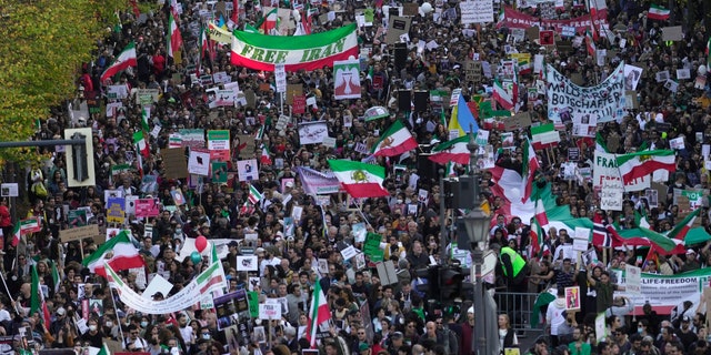 People participate in a protest against the Iranian regime, in Berlin, Germany, on Saturday 22 October 2022, following the death of Mahsa Amini in the custody of the notorious "moral police."