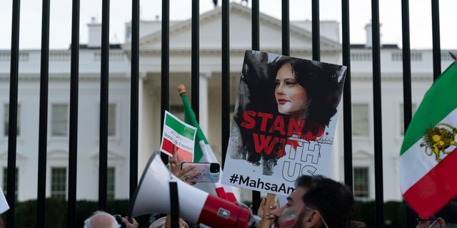 Protesters gather outside the White House to protest the Iranian regime in Washington on October 22, 2022. 
