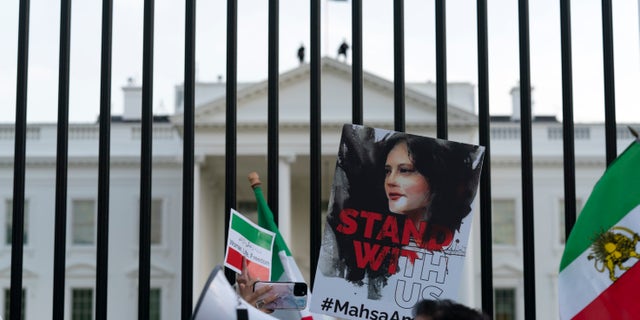 Protesters gather outside the White House to protest the Iranian regime in Washington on October 22, 2022. 