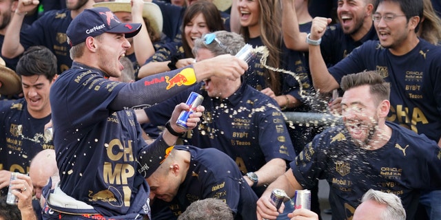 Red Bull driver Max Verstappen of the Netherlands celebrates with the Red Bull team following the Formula One U.S. Grand Prix auto race at Circuit of the Americas Sunday, Oct. 23, 2022, in Austin, Texas.