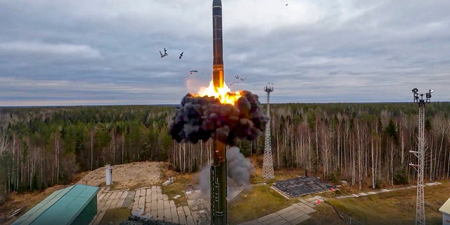 In this handout photo taken from video released by Russian Defense Ministry Press Service on Wednesday, Oct. 26, 2022, a Yars intercontinental ballistic missile is test-fired from a launch site in Plesetsk, northwestern Russia. 