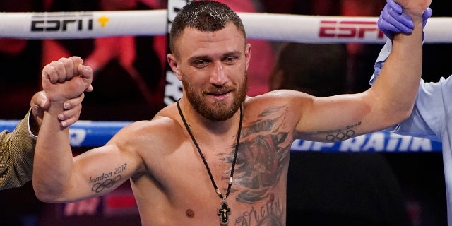 Vasiliy Lomachenko, of Ukraine, celebrates after defeating Masayoshi Nakatani, of Japan, during a lightweight bout Saturday, June 26, 2021, in Las Vegas.