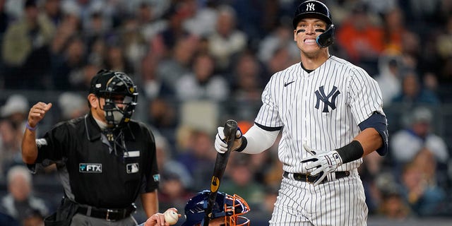 Aaron Judge of the New York Yankees reacts after striking out the Houston Astros during Game 3 of Game 3 of the American League Championship Baseball Series in New York, Saturday, Oct. 22, 2022.