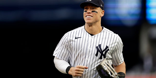 New York Yankees right fielder Aaron Judge runs to the dugout during the sixth inning of the team's baseball game against the Baltimore Orioles on Saturday, Oct. 1, 2022, in New York. 