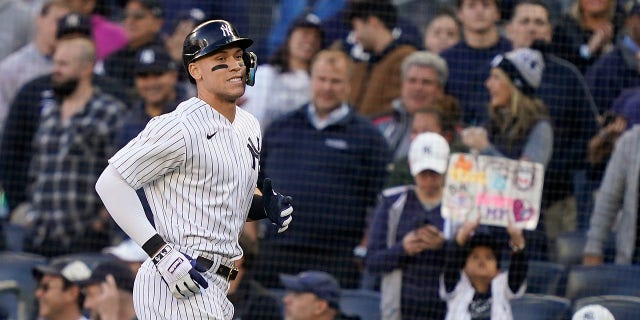 New York Yankees outfielder Aaron Judge comes off the field after grounding out against the Cleveland Guardians during the ninth inning of Game 2 of their American League Division Series in New York on Friday.