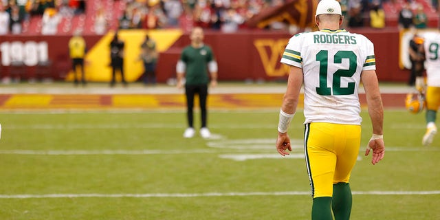 Green Bay Packers quarterback Aaron Rodgers, #12, walks off the field after the Packers' game against the Washington Commanders at FedExField Oct. 23, 2022 in Landover, Maryland.