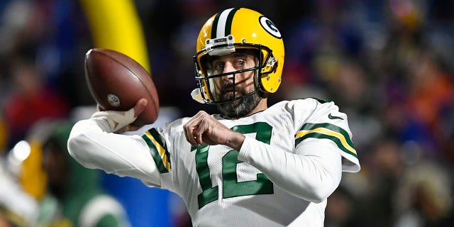 Green Bay Packers quarterback Aaron Rodgers (12) warms up an NFL football game against the Buffalo Bills Sunday, Oct. 30, 2022, in Orchard Park.