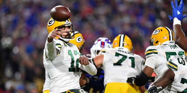 Green Bay Packers quarterback Aaron Rodgers (12) throws a pass during the first half against the Buffalo Bills, Oct. 30, 2022, in Orchard Park, New York.