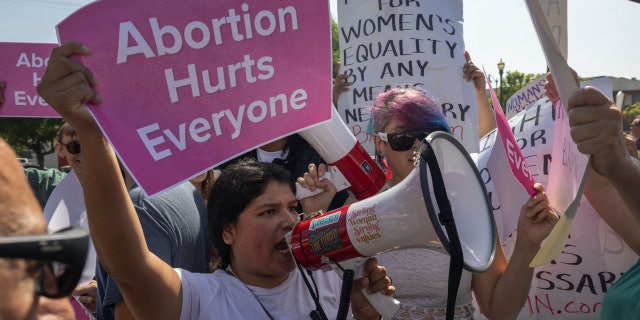 Pro-life demonstrators crash the Women's March Action Rally for Reproductive Rights at Mariachi Plaza in Los Angeles, California, on Oct. 8, 2022.