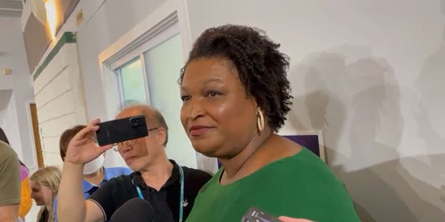 Democratic Georgia gubernatorial nominee Stacey Abrams addresses the media after a rally with Asian-American voters in Atlanta, Ga. Oct. 7, 2022.