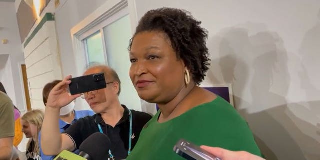 Democratic Georgia gubernatorial nominee Stacey Abrams addresses the media after a rally with Asian-American voters in Atlanta, Ga. Oct. 7, 2022.