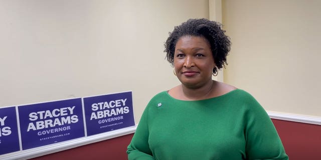 Democratic Georgia gubernatorial nominee Stacey Abrams speaks with Fox News' Brandon Gillespie following a rally with the Asian-American community in Gwinnett County, Georgia, on Oct. 7, 2022.