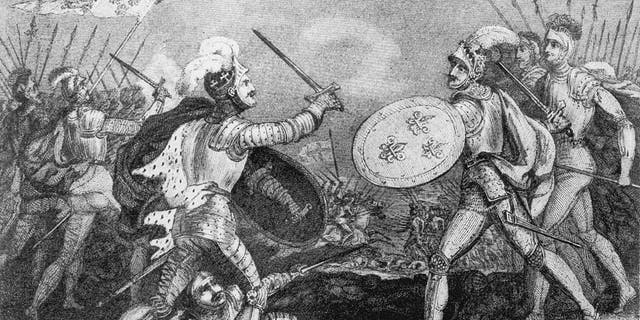 King Henry V (1387-1422, left) defends his brother against the French at the Battle of Agincourt during the Hundred Years War, Oct. 25, 1415. The English army defeated the French army.