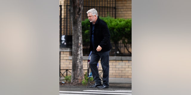 Alec Baldwin is spotted looking downcast while stepping out to lunch in New York City. The sighting comes days after the Santa Fe County District Attorney's Office said that up to four people, including Baldwin, could be charged in the fatal shooting of cinematographer Halyna Hutchins.
