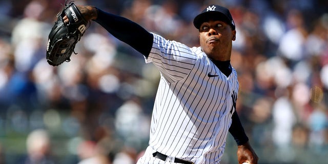Aroldis Chapman #54 of the New York Yankees in action against the Kansas City Royals during a game at Yankee Stadium on July 30, 2022 in New York City.