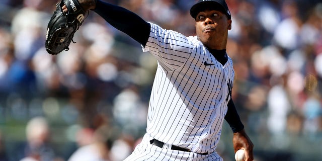 Aroldis Chapman #54 of the New York Yankees in action against the Kansas City Royals during a game at Yankee Stadium on July 30, 2022, in New York City.