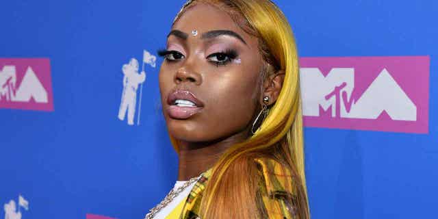 Asian Doll arrives at the MTV Video Music Awards at Radio City Music Hall on Aug. 20, 2018, in New York. Two people were shot and others were injured after gunfire broke out at a North Carolina college homecoming concert featuring rapper Asian Doll, on Oct. 15, 2022.