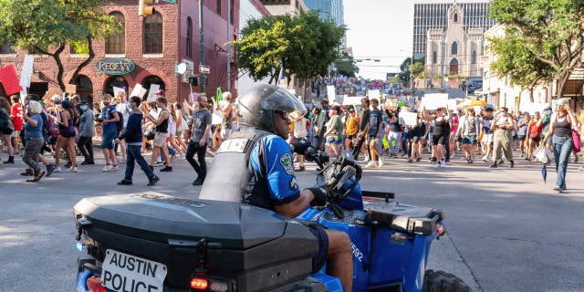 Police enforcement block the streets in order to prevent abortion rights demonstrators from nearing the police station in Austin, Texas.