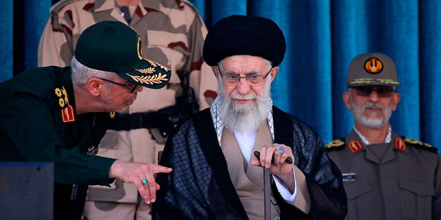 Iran;s Supreme Leader Ayatollah Ali Khamenei, center