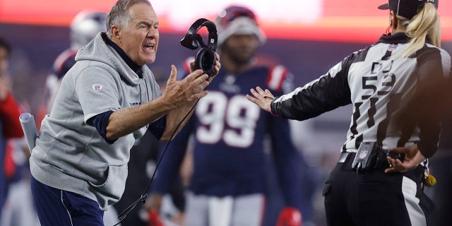 New England Patriots head coach Bill Belichick argues a call during the second half of an NFL football game against the Chicago Bears, Monday, Oct. 24, 2022, in Foxborough, Mass.