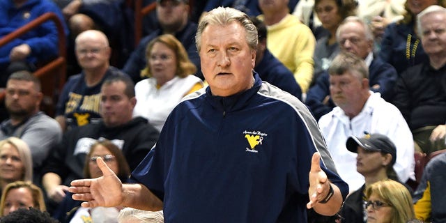 Head coach Bob Huggins of the West Virginia Mountaineers looks on during the Shriners Children's Charleston Classic college basketball game against the Marquette Golden Eagles at TD Arena on November 19, 2021, in Charleston, South Carolina.