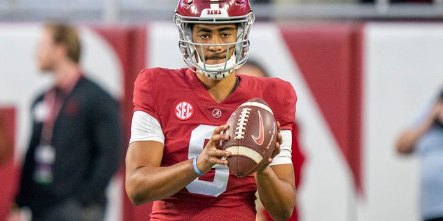 Alabama Crimson Tide quarterback Bryce Young warms up before a game against the Aggies at Bryant-Denny Stadium on October 8, 2022.