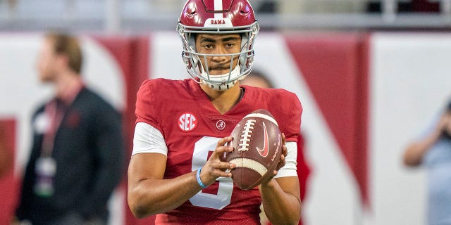 Alabama Crimson Tide quarterback Bryce Young warms up before a game against the Aggies at Bryant-Denny Stadium on October 8, 2022.