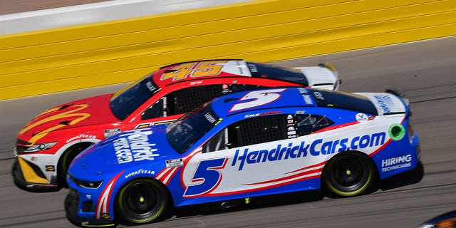 Oct 16, 2022; Las Vegas, Nevada, USA; NASCAR Cup Series driver Kyle Larson (5) and driver Bubba Wallace (45) drive for position during the South Point 400 at Las Vegas Motor Speedway.