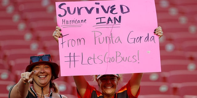 Fans cheer from the stands before the game between the Kansas City Chiefs and Tampa Bay Buccaneers at Raymond James Stadium on Oct. 2, 2022, in Tampa, Florida.