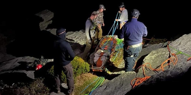 First responders raced to help a hiker who fell about 45 feet from the top of Hawksbill Mountain in Burke County, North Carolina, on Saturday night.