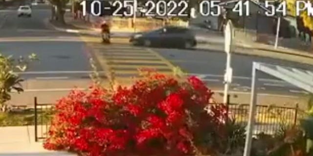 Surveillance footage shows the moment before two pedestrians were struck by a vehicle in San Jose. 