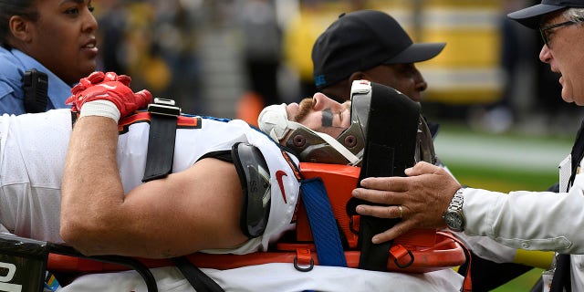 Tampa Bay Buccaneers tight end Cameron Brate is carted off the field after being injured during the second half of an NFL football game against the Pittsburgh Steelers in Pittsburgh, Sunday, Oct. 16, 2022.